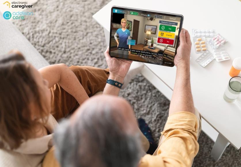 Senior using a virtual caregiver tablet at home